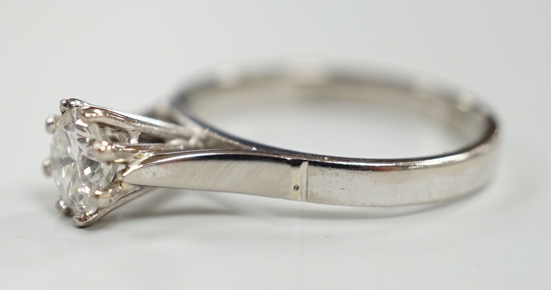 An 18ct white metal and solitaire diamond set ring, size Q, gross weight 4.6 grams, the stone measuring 6.3mm in diameter.